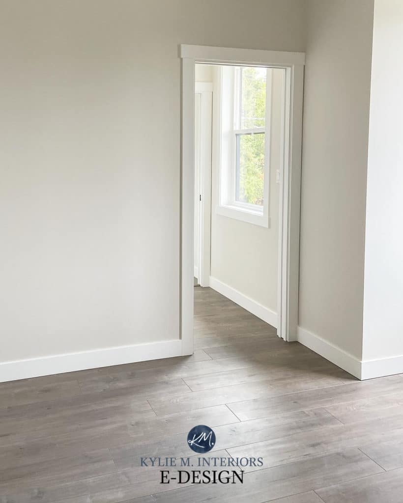 Gray wash wood or laminate flooring, Benjamin Moore Classic Gray, warm gray taupe paint colour on walls. Off-white. Kylie M Interiors diy design blog and online paint colour consulting, Edesig