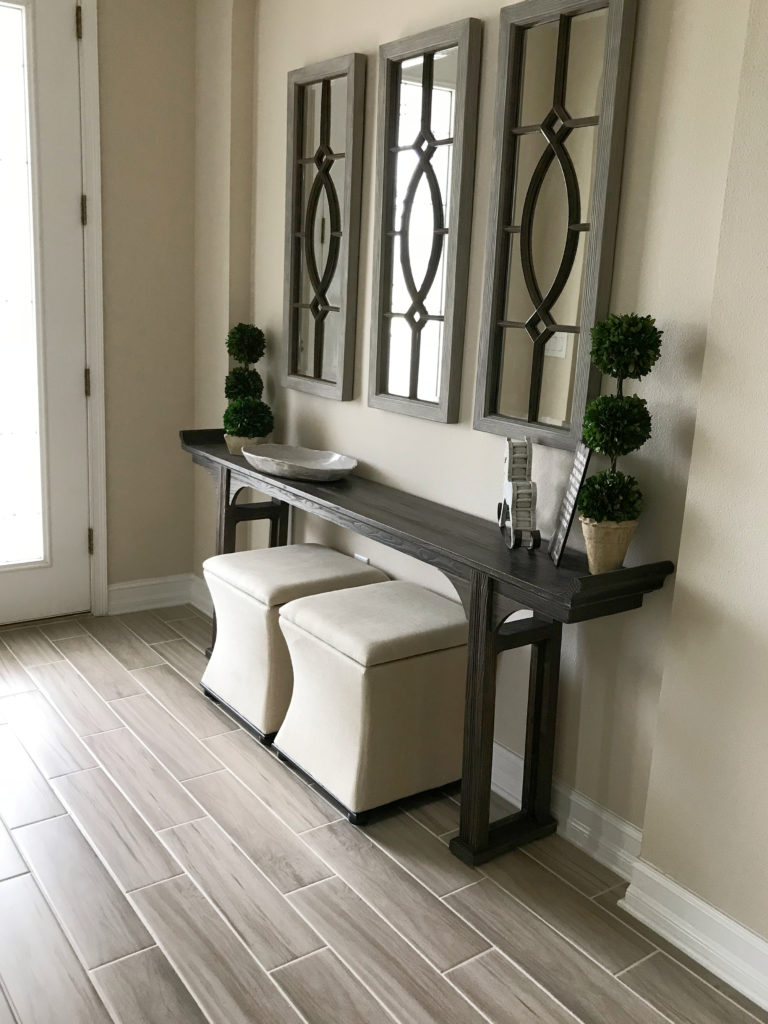 Sherwin Williams China Doll with taupe tile floor, entryway with home decor. Kylie M Interiors Edesign client BEFORE