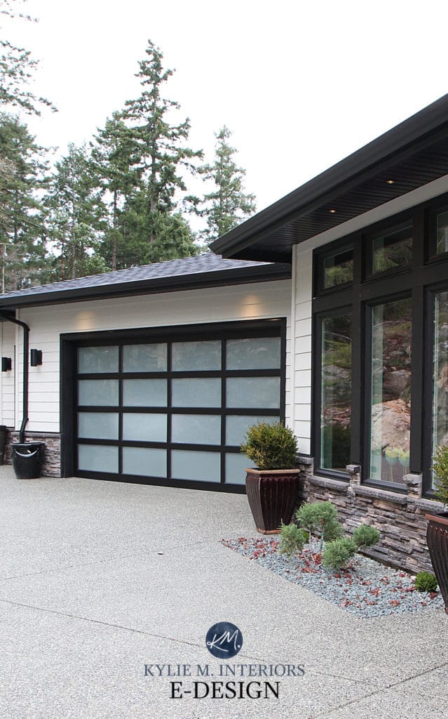Exterior with black gutters, drainspout, trim, windows and garage door. Kylie M Interiors Edesign