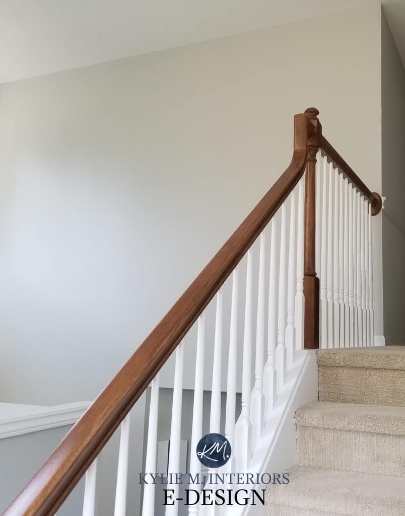 Best gray paint colour, Benjamin Moore Gray Owl, lightened, beige tan carpet, white and wood stair railing. Kylie M Interiors Edesign, online popular paint color expert and diy decorating blogger