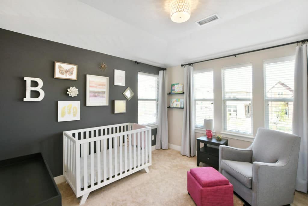 Feature or accent wall Kendall Charcoal in nursery room warm greige walls, beige carpet. Kylie M interiors, client photo