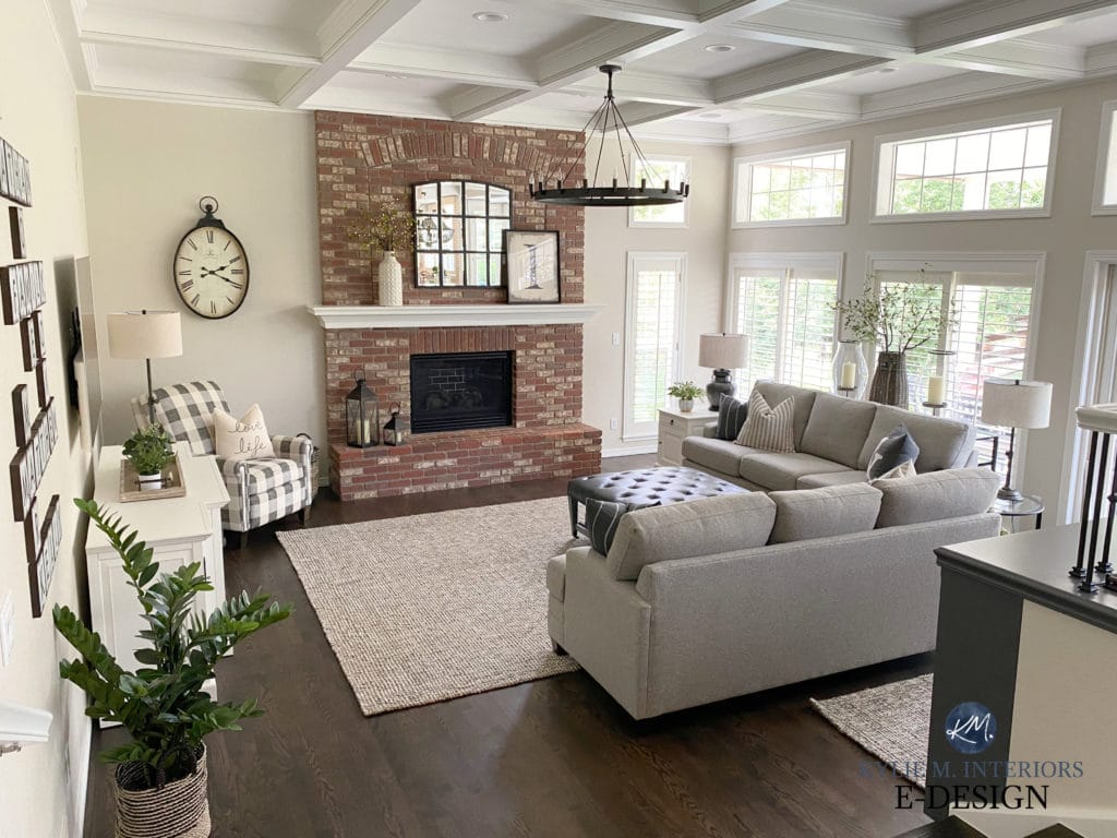 Dark wood floor, pink red brick fireplace, greige walls and White Dove in family room or living room. Edesign by Kylie M Interiors, online paint color consultant