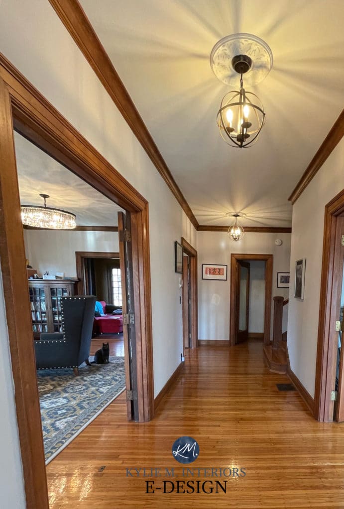 Entryway and hallway, dark wood trim and wood flooring. Kylie M Interiors Edesign.