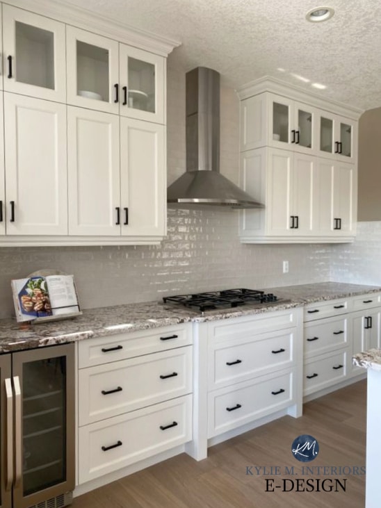 Maple dark wood cabinets painted Benjamin Moore Classic Gray, warm grey paint colour. Granite countertop, subway tile in taupe greige. Kylie M Interiors, online paint color consultant