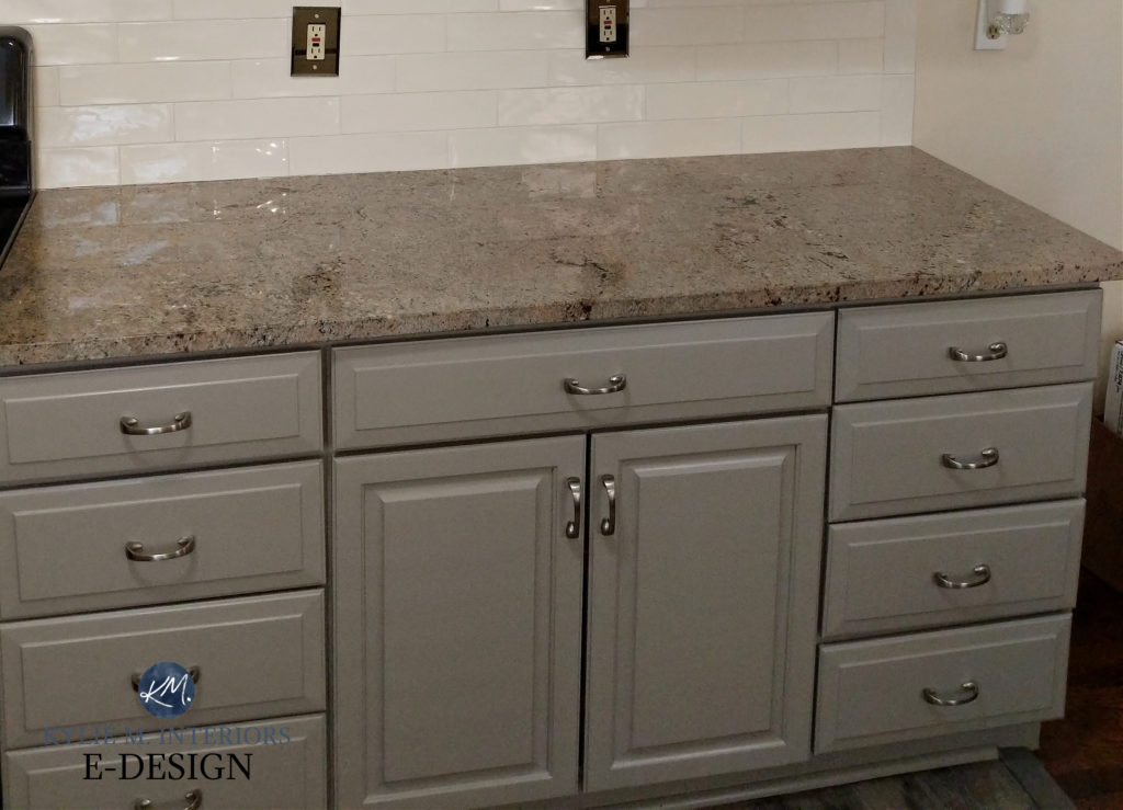 Benjamin Moore Rockport Gray greige taupe painted kitchen cabinets with beige taupe granite countertop and cream tile. Kylie M Interiors Edesign