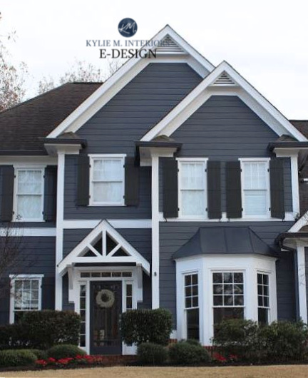 Exterior with warm gray taupe roof, white siding, metal roof detail, Wrought Iron shutters and front door,Benjamin Moore Gray 2121-10. Kylie M Interiors Edesign, diy curb appeal update ideas