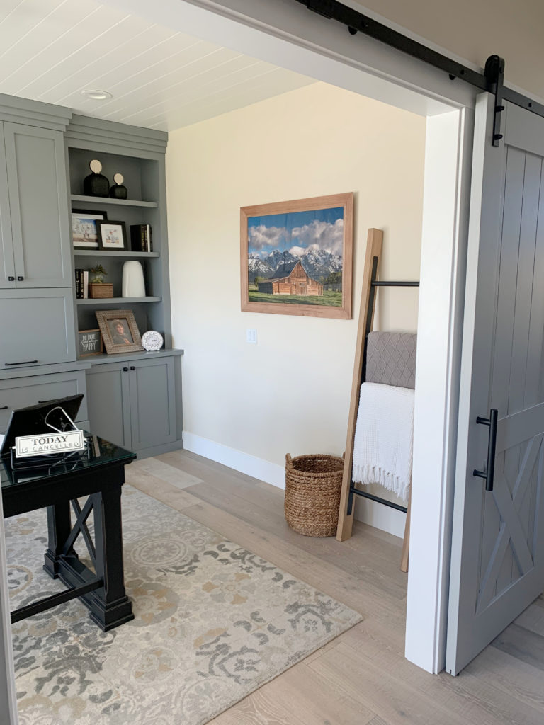 Farrow and Ball Clunch with whitewash oak wood floor, Magnolia Teak Cups built in office cabinets, sliding barn door. CLIENT PHOTO of Kylie M Interiors Edesign