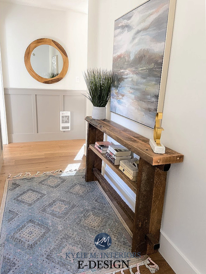 Benjamin Moore Graystone, painted warm gray board and batten, White Dove walls, round mirror, white oak floor and home decor. Kylie M Interiors Edesign