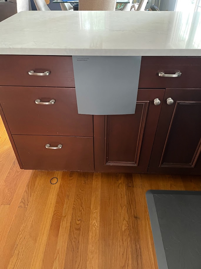 Benjamin Moore Trout Gray for painted cherry cabinet with white quartz countertop. Kylie M INteriors Edesign