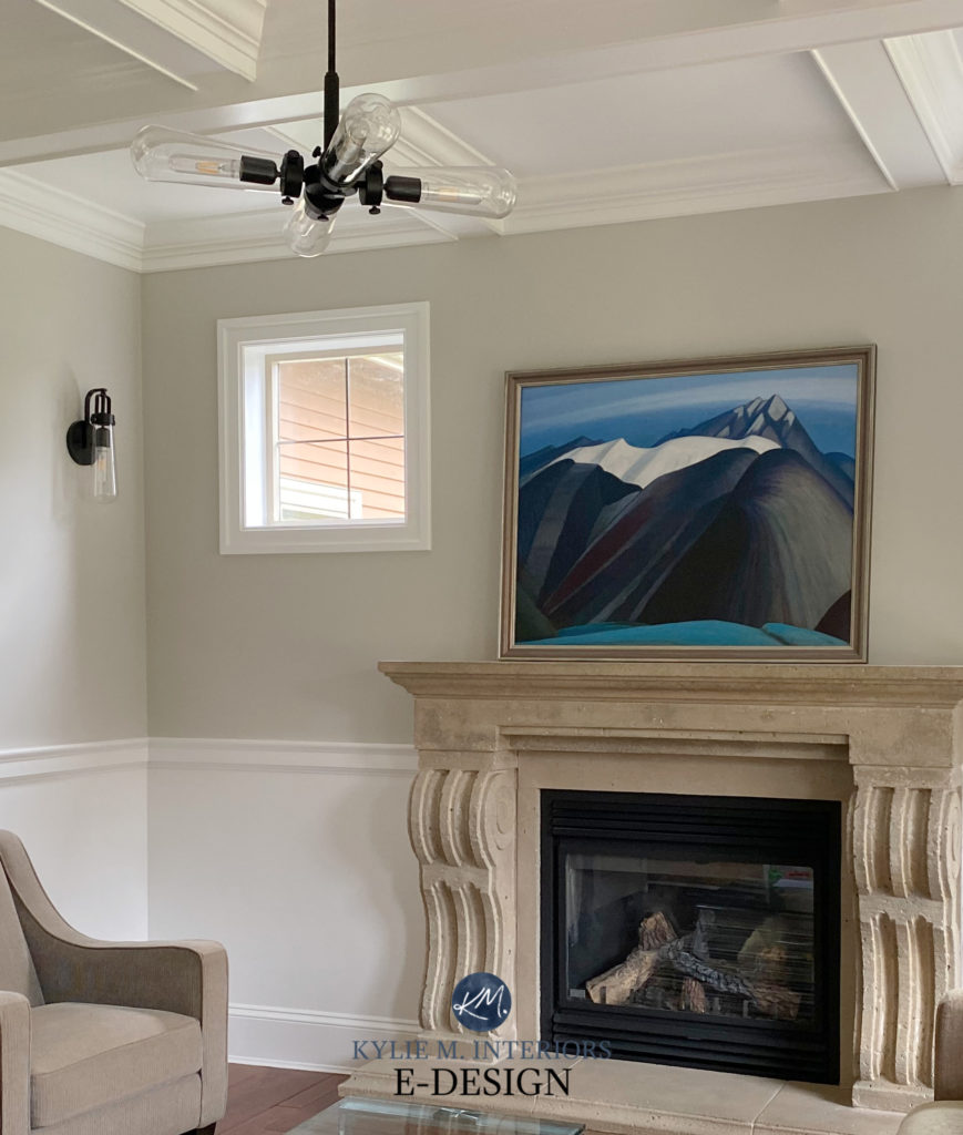 Benjamin moore Balboa Mist with stone fireplace, wainscoting and coffered ceilings. Kylie M Interiors Edesign