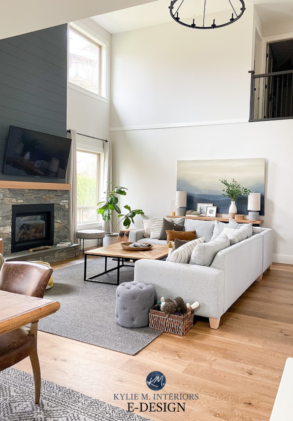 Review of Sherwin Williams Roycroft Pewter, dark gray paint colour. Fireplace with shiplap stone, round chandelier in living room. Kylie M Interiors Edesign (3)