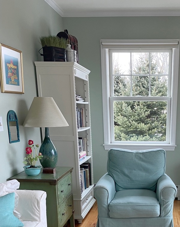 Benjamin Moore Prescott Green, popular green paint color with blue-green chair, white trim. Cilent photo of KYlie M Interiors Edesign