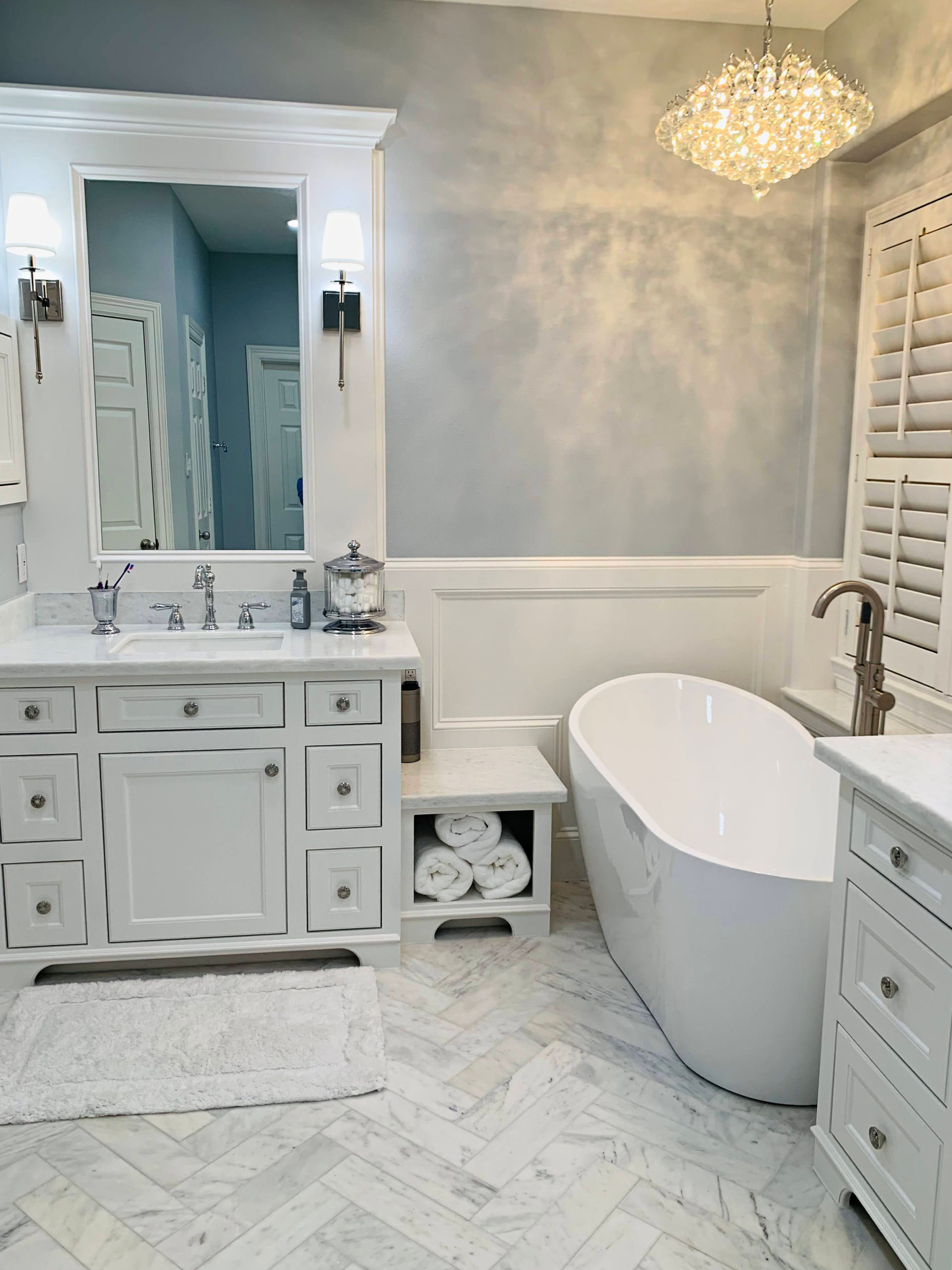 Sherwin Williams North Star, Benjamin Moore chantilly Lace ensuite bathroom, mrable countertop, floor, free standing bathtub, chandelier. Kylie M Interiors Edesign client photos