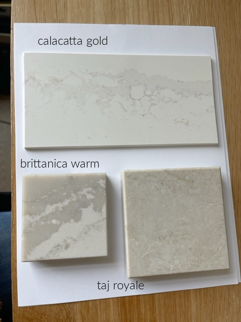Calacatta Gold, Brittanica Warm and Taj Royale quartz countertops, warm off white (1)