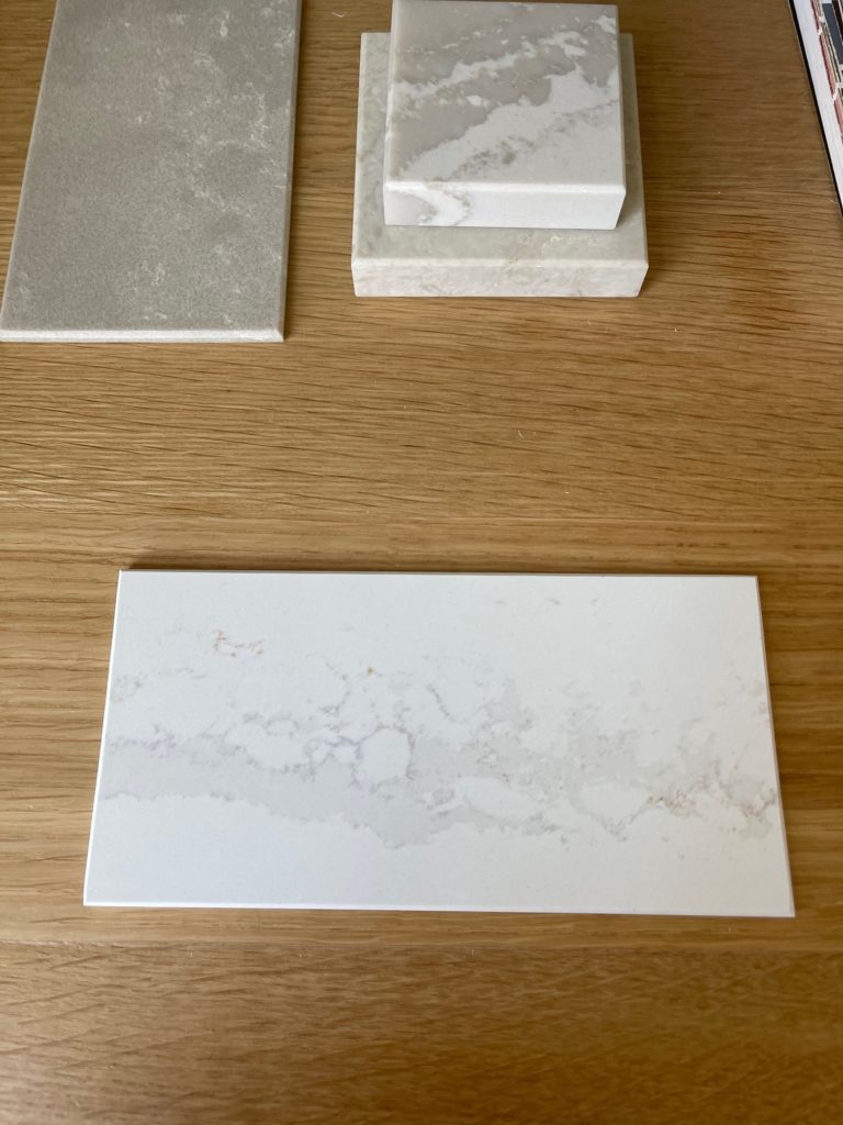 Calacatta Gold silestone white quartz countertop, marble look warm
