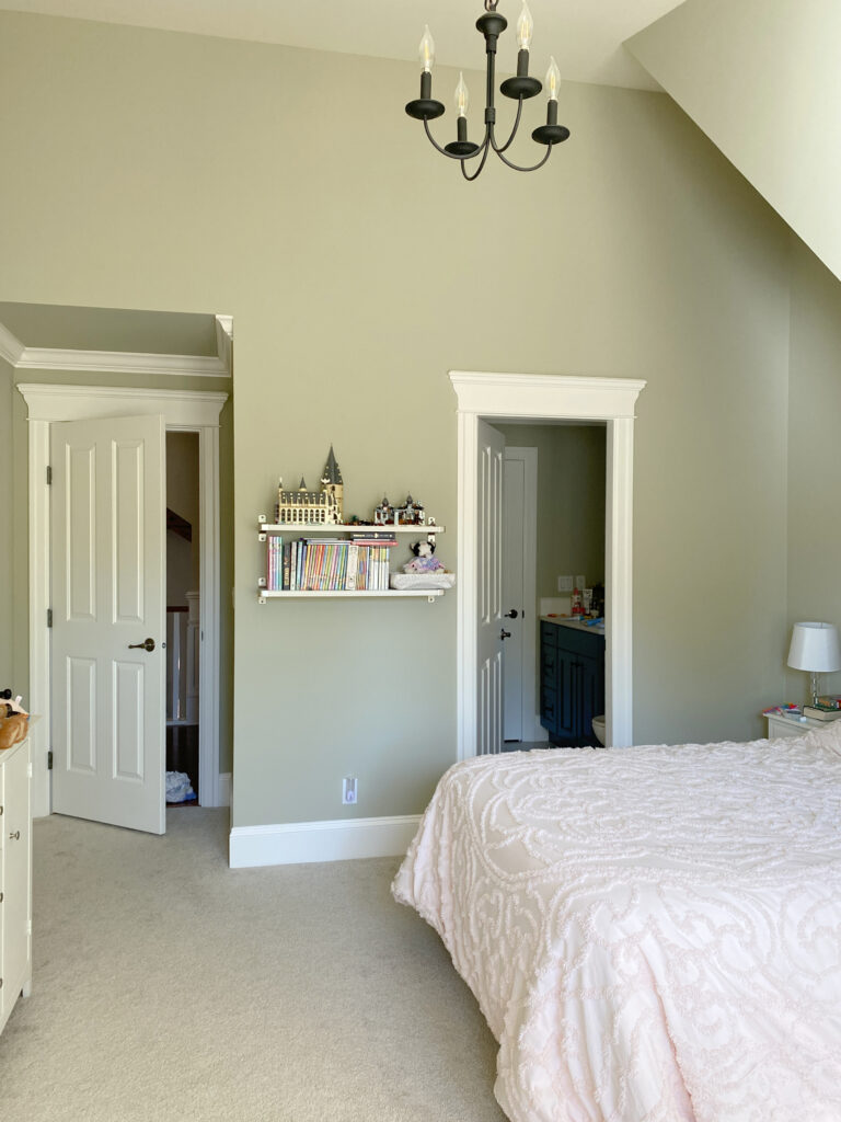 Benjamin Moore best green paint colour, Spanish Olive, beige tan carpet, pink bedding. Kylie M Before photo