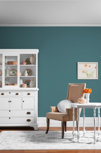 PPG, Glidden Vining Ivy in room with orange accents and white buffet. Visualizer with Kylie M.