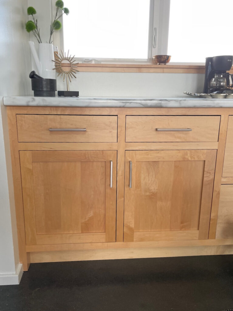 budget friendly ideas update wood cabinets, formica marble look countertops. Kylie M