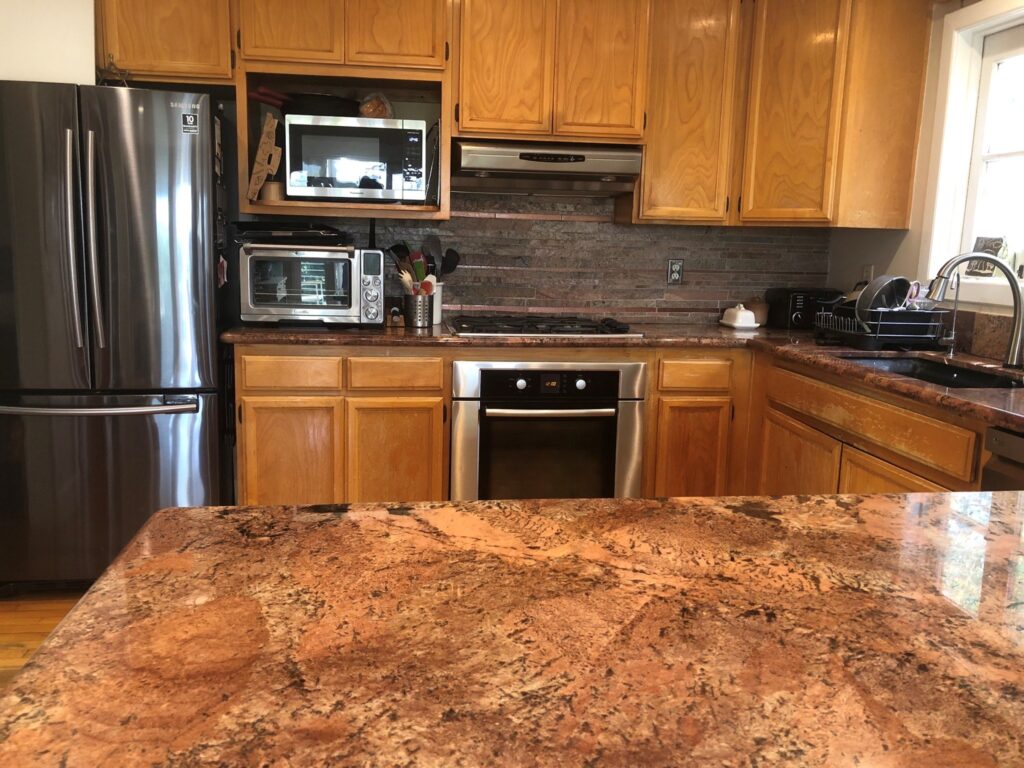 maple wood cabinets, granite countertops before painting
