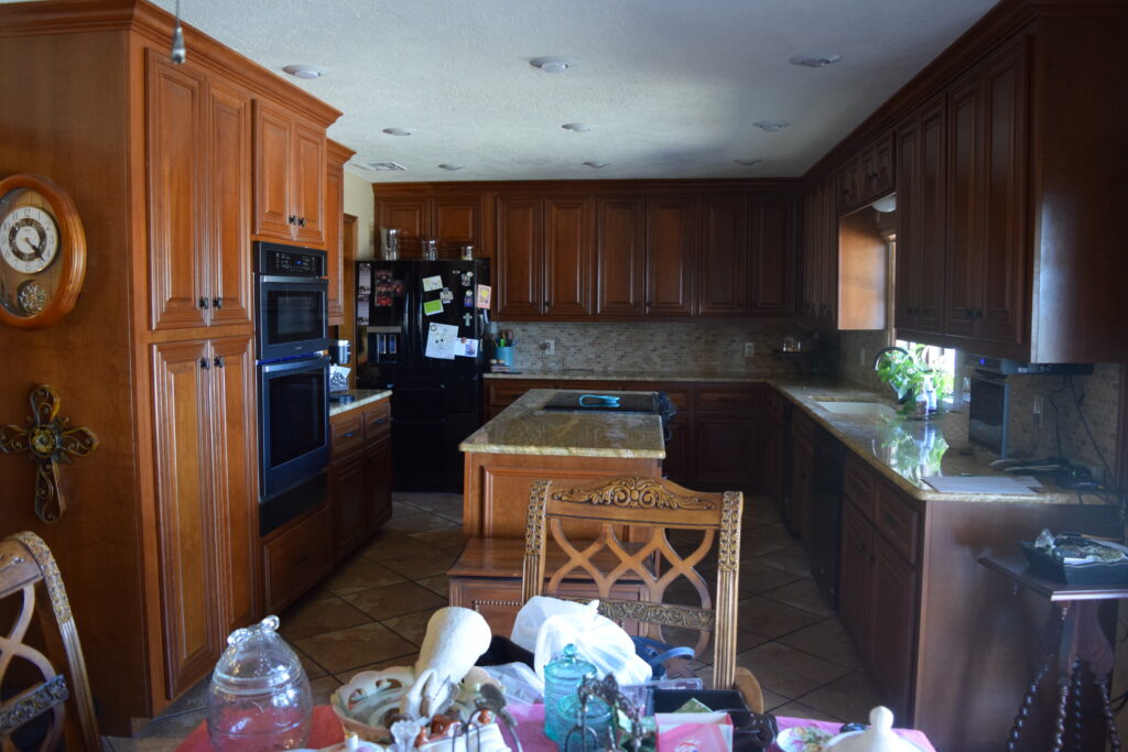 BEFORE kitchen cabinets being painted, wood cabinets, travertine, granite, tile floor