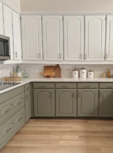 kitchen wood floor, painted maple cabinets, Benjamin White Dove upper, Antique Pewter green lowers, white quartz. Kylie M Edesign update ideas. Maritime White wall pain