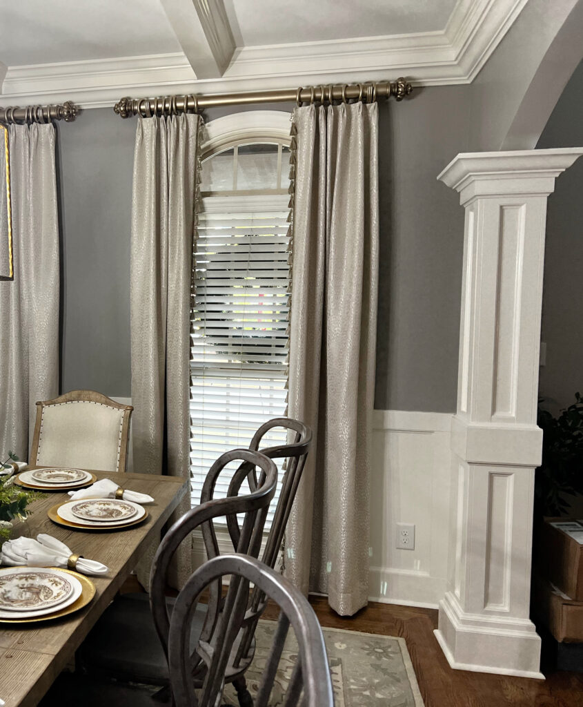 Dining room drapes, wainscoting and trim Sherwin Williams Alabaster, wall paint color Dorian Gray