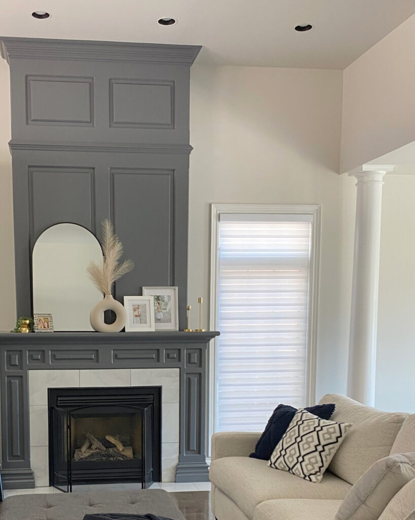 Living room, fireplace molding, Benjamin Moore Charcoal Slate, Citiy Loft walls. taupe sofa, home decor. Kylie M Online Paint color consulting exp