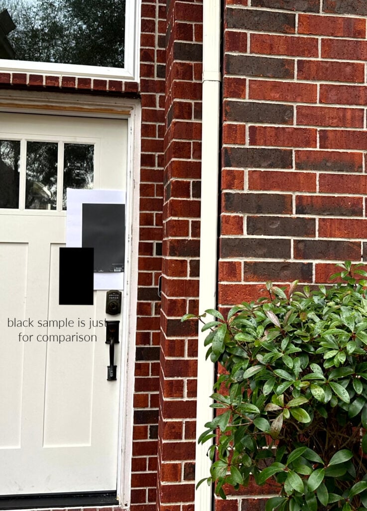 red brick exterior with best front door paint color, Benjamin Moore shade of black. Kylie M Edesign