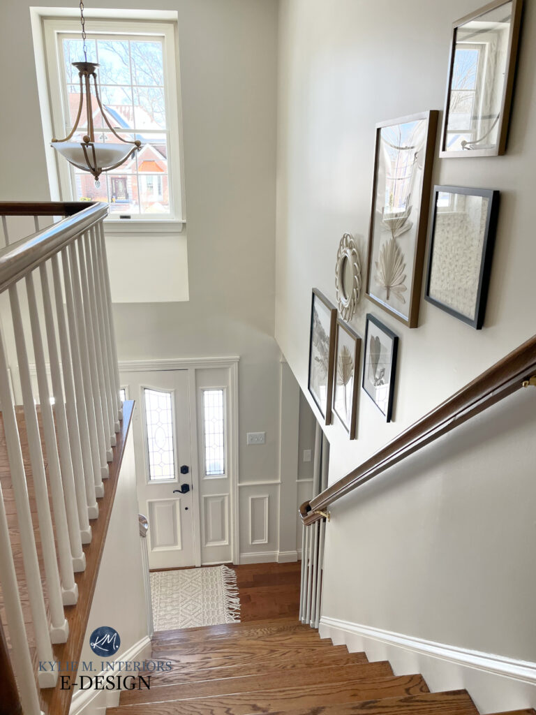 Benjamin Moore Ballet White, best warm opff white, red oak floor, White Dove trim, gallery wall in staircase, two storey entryway