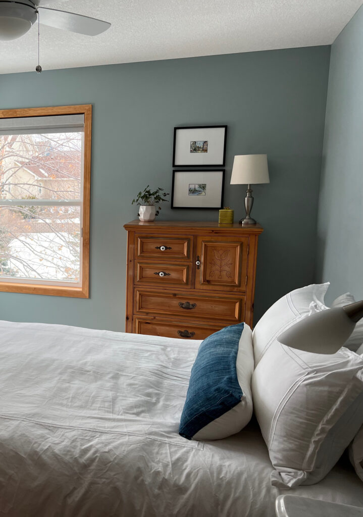 Benjamin Moore Mount Saint Anne, best top blue green gray paint colors, wood orang stained trim, bedroom, Kylie M Online paint color expert