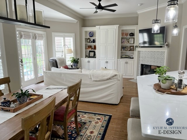 Sherwin Williams Accessible Beige with built-ins painted warm white Alabaster, wood floor. Kylie M Online paint color consultant