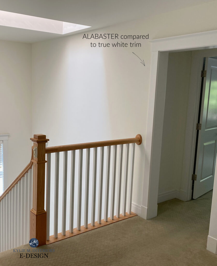 Sherwin Williams Alabaster with white trim in staircase. White trim shows yellow in Alabaster (2)
