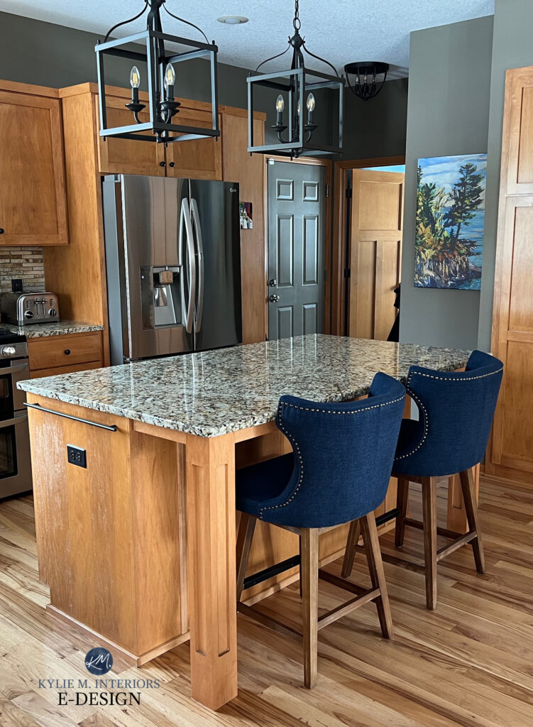 Wood kitchen island cabinets, orange stain, wood floor,granite countertops, stainless steel, pendants, Benjamin Moore Texas Leather greige brown gray blend green