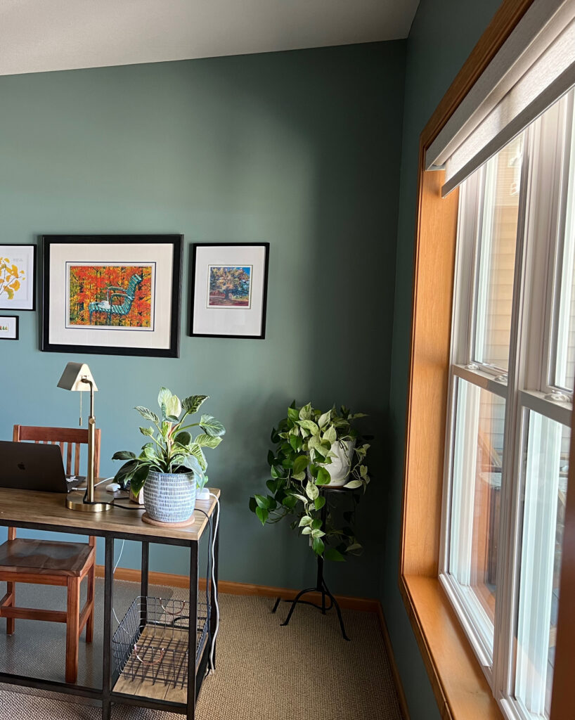 Wood orange stain trim, beige carpet, Benjamin Moore Knoxville Gray best blue green paint colors. Kylie M Interiors