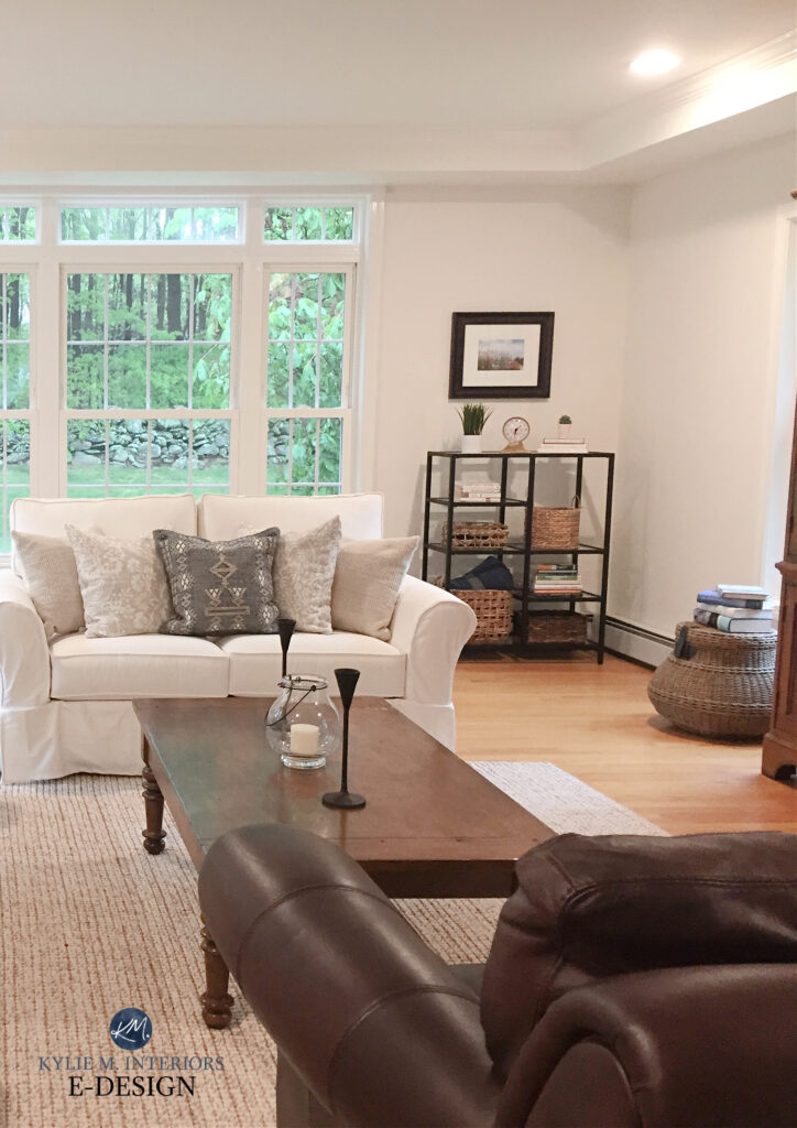 family room or living room, white slipcovered sofa, leather chair, Benjamin Moore White Dove walls, trim, tray ceiling