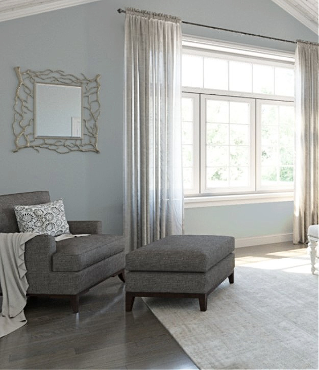 Best shade of blue, Sherwin Williams Upward paint color with dark gray chair.