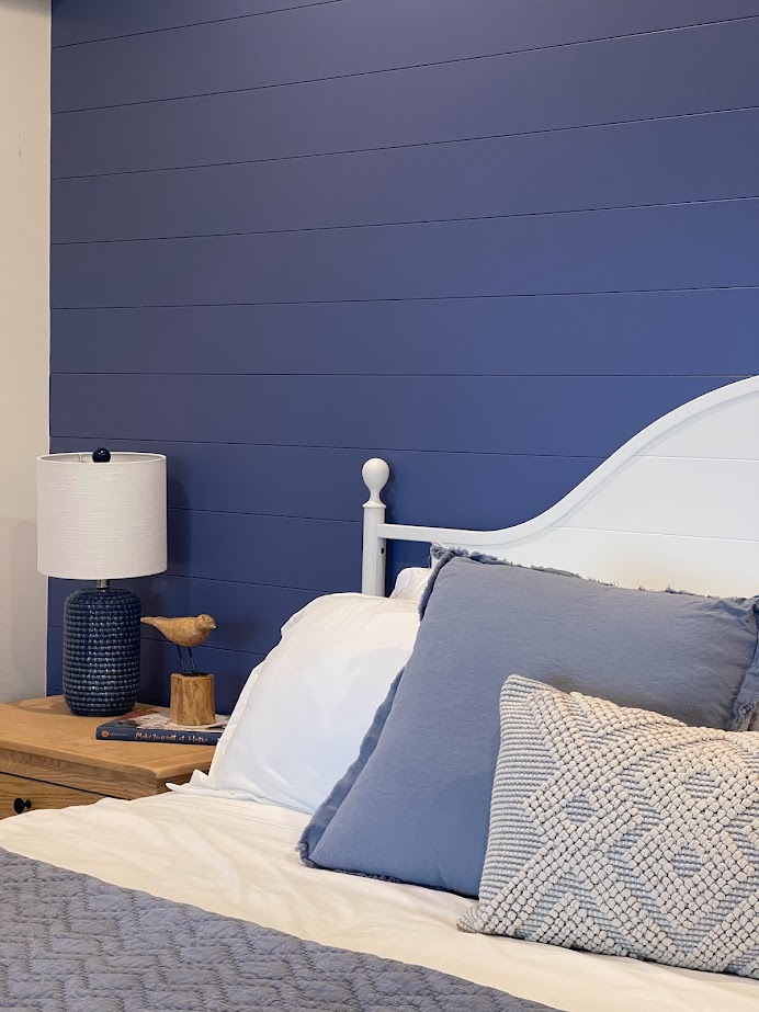 Benjamin Moore Blue Nova in guest bedroom on shiplap accent wall with white linens and white oak. Best bright medium toned shade of blue. Kylie m