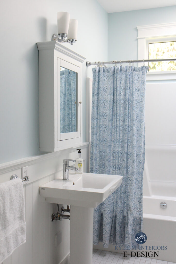 Benjamin Moore Ocean Air in small bathroom, pedestal sink, fibreglass shower, wainscoting, beadboard in Cloud White. Kylie M Interiors