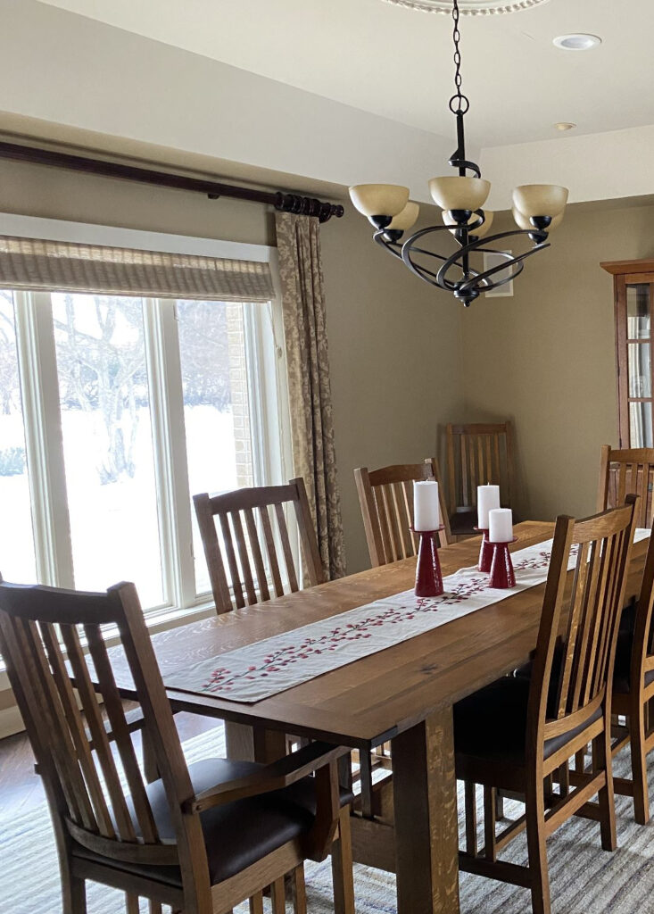 Dining room with tray, recessed, high ceiling, panned. Oak dining room set, drapes. Kylie M