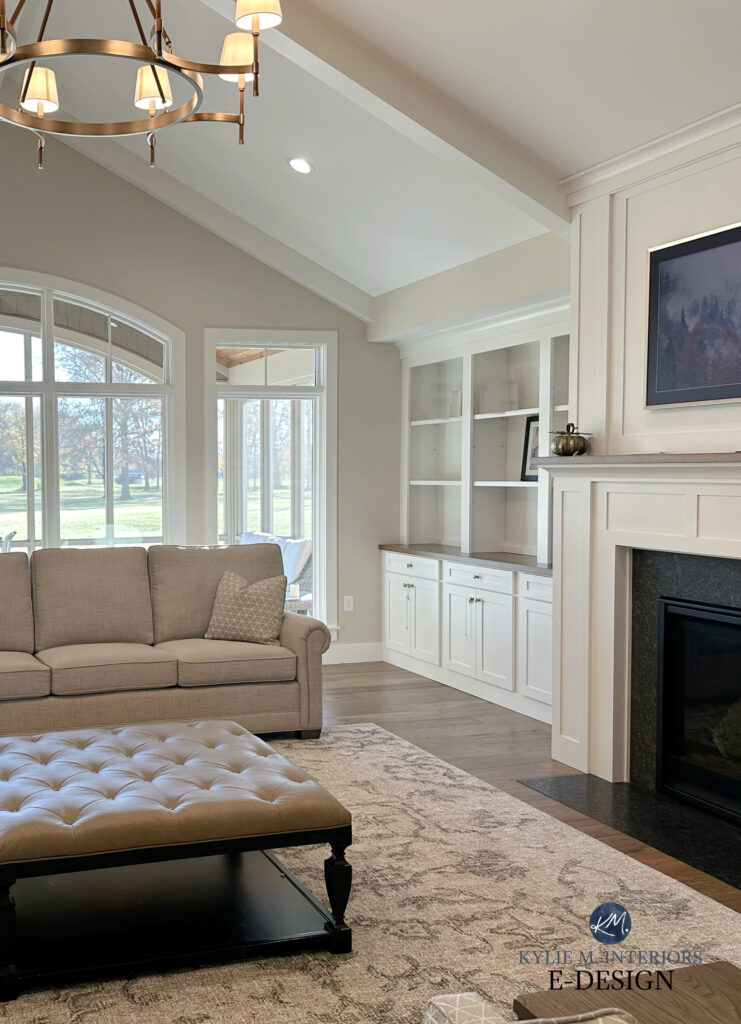 Edgecomb Gray, Sherwin Pure White trim, living room great room, vaulted ceiling, taupe sofas, white built ins, area rug, arched window. Kylie M Interiors edesign
