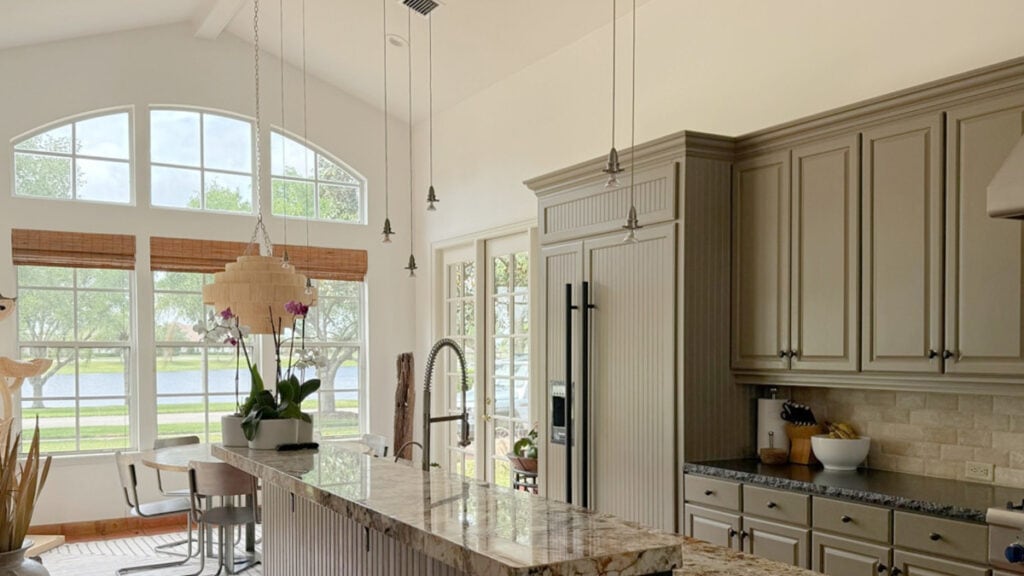Greige cabinets with gold and cream