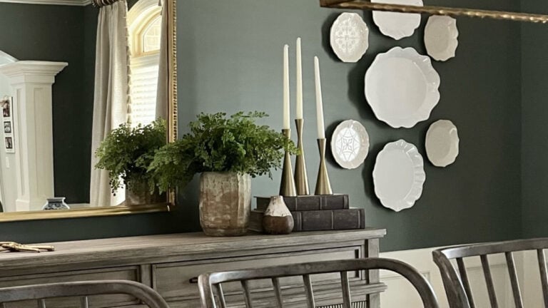 Sherwin Williams Retreat, popular green paint color with plate gallery display in dining room with home decor