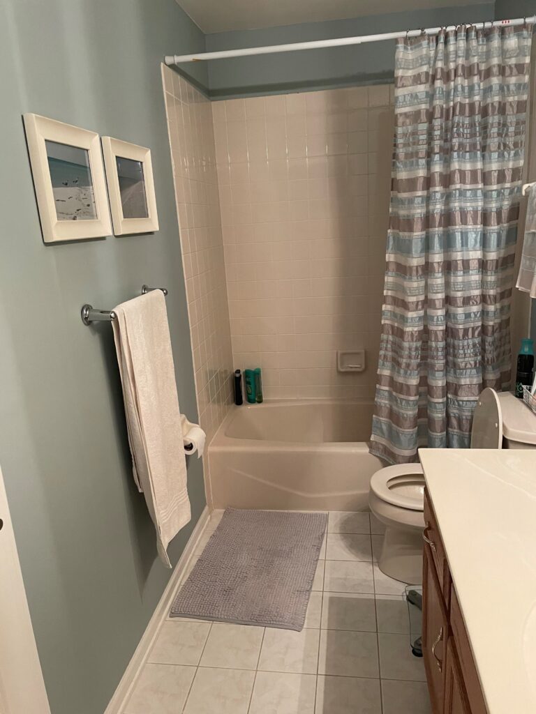 1990 bathroom before update, wood oak vanity, tile floor, taupe tub surround (2)
