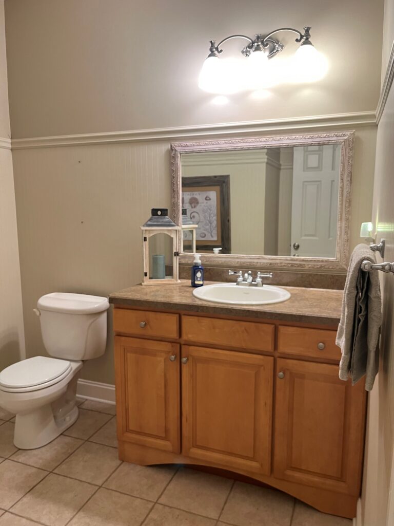 bathroom before update remodel, 1990 beadboard, wood oak vanity, laminate countertop, tile floor (1)