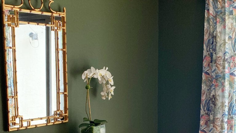 Home office painted Sherwin Williams Secret Garden, a gorgeous dark green paint color