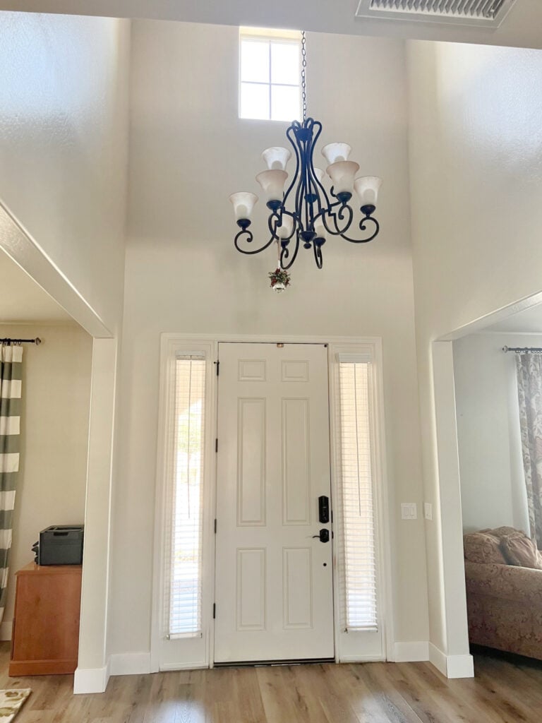 Benjamin Moore Edgecomb Gray in foyer or entryway, white front door. Kylie M Edesign, best warm gray greige or taupe paint color (2)