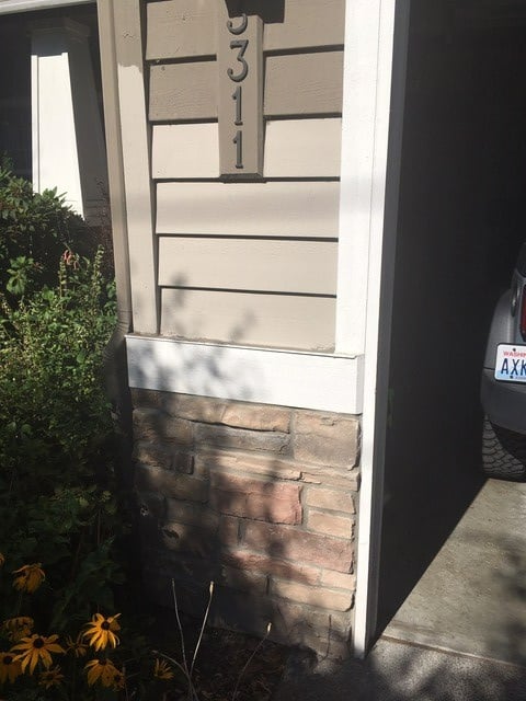 Soft medium depth taupe greige blend in sunshine with exterior stone with taupe,m beige, brown, warm gray