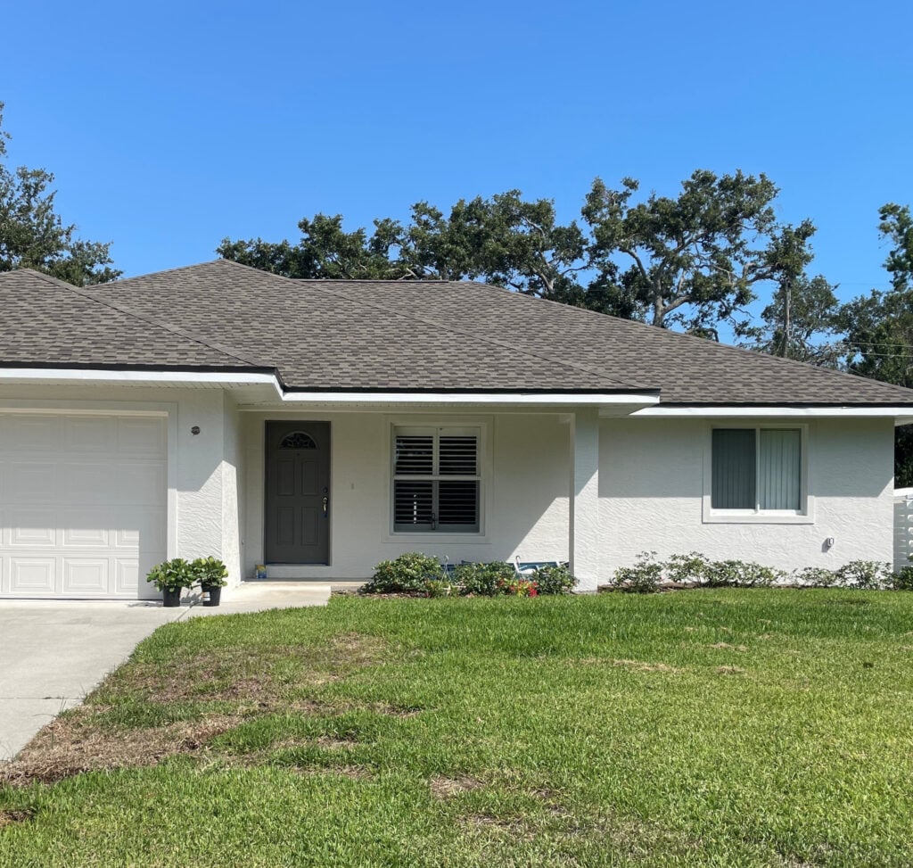 Sherwin Williams Egret White, Pure White, stucco exterior with asphalt roof and white windows