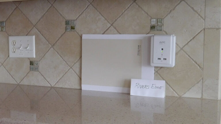 Sherwin Williams Rivers Edge (beige) paint sample with backsplash tile and countertop (formerly China Doll).