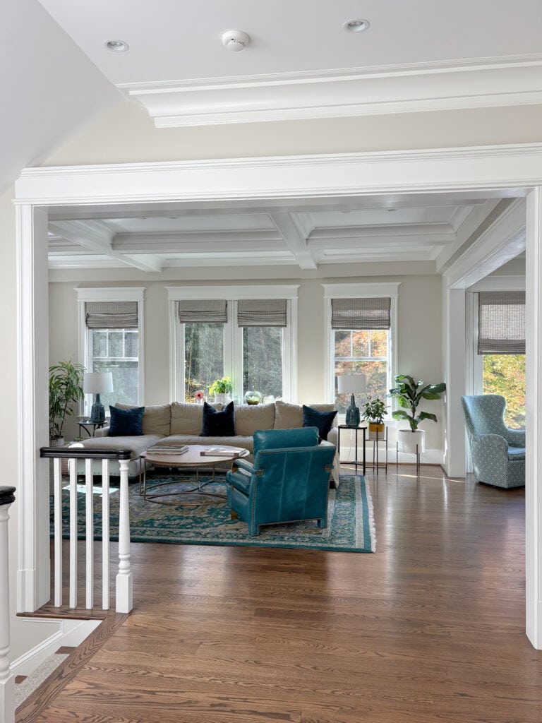 Oak wood flooring, Coffered ceiling and trims in BEnjamin MOore White Dove, Edgecomb Gray walls, teal accents